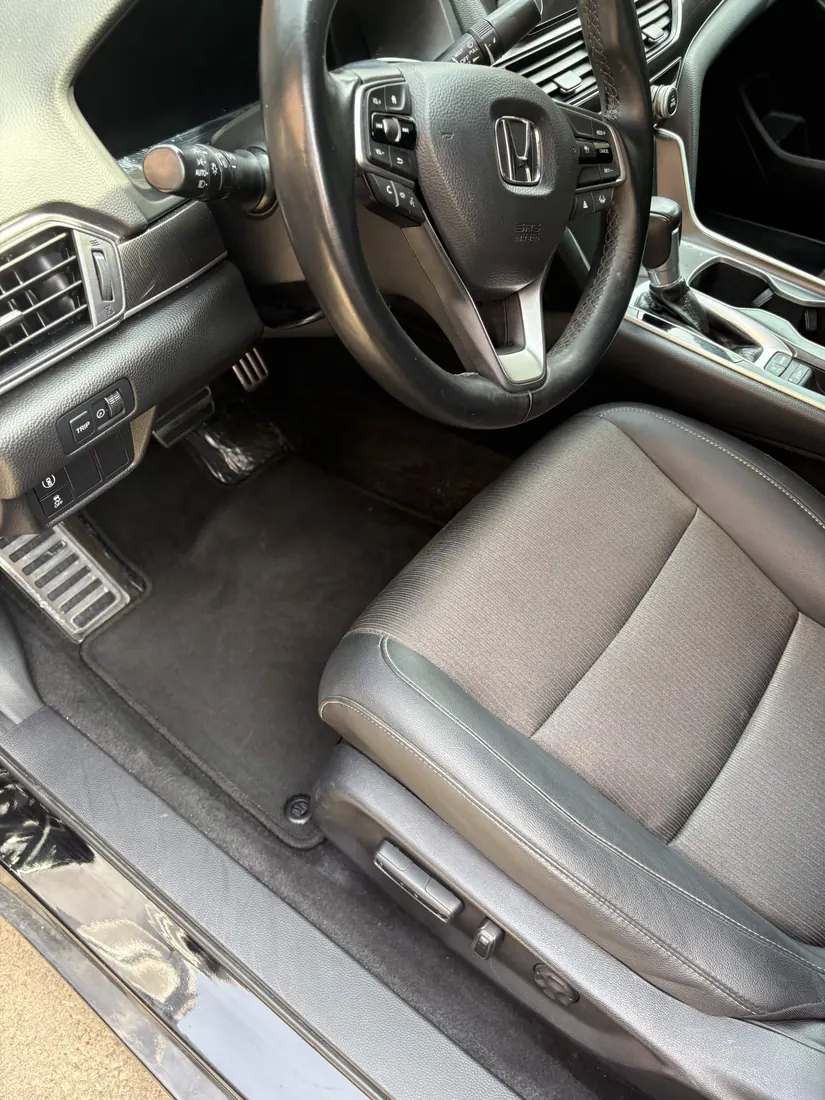 Driver seat, pedals and floor mat after interior detail
