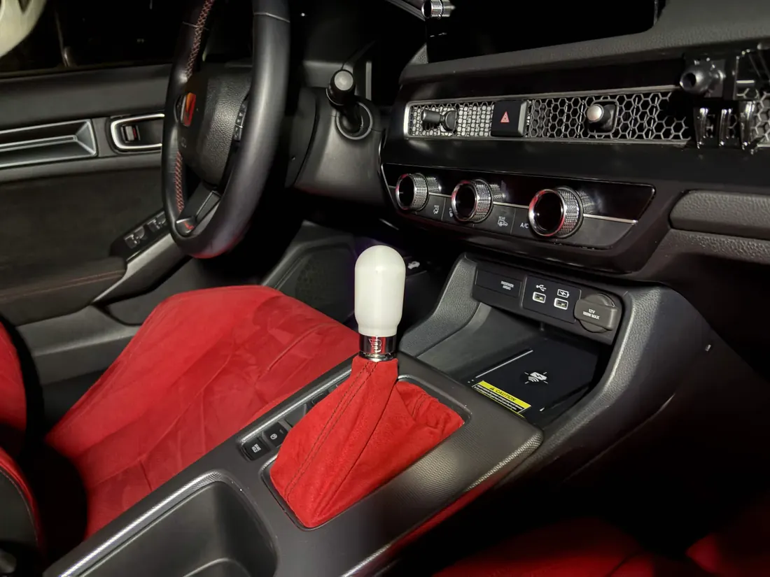 Red shift boot and center console after detailing