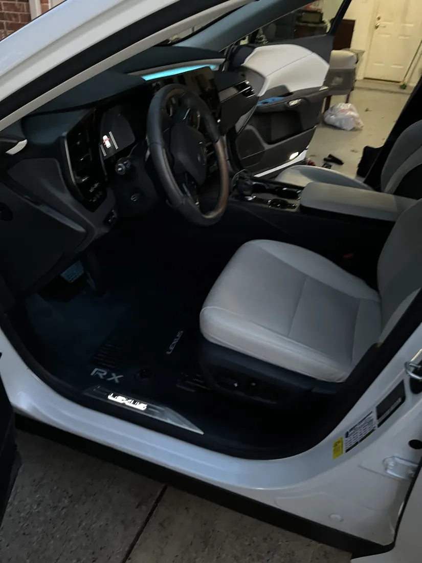 Detailed front cabin with cream leather seat and clean floor mats
